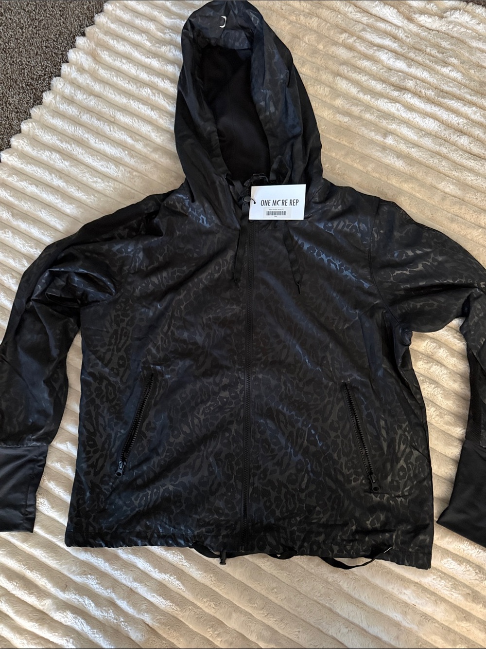 ZYIA Black Hooded Bomber Jacket with Subtle Animal Print